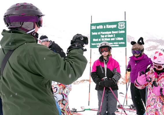 U.S. Forest Service ski ranger Nancy McNab talks about safety before taking a group skiing as part of the Arapahoe National Forest’s Ski with a Ranger program. (U.S. Forest Service)