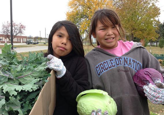 Students at Circle of Nations School gathered vegetables that they grew in the school’s garden.  They used the kale and cabbage in a “Healthy Choices” cooking class.