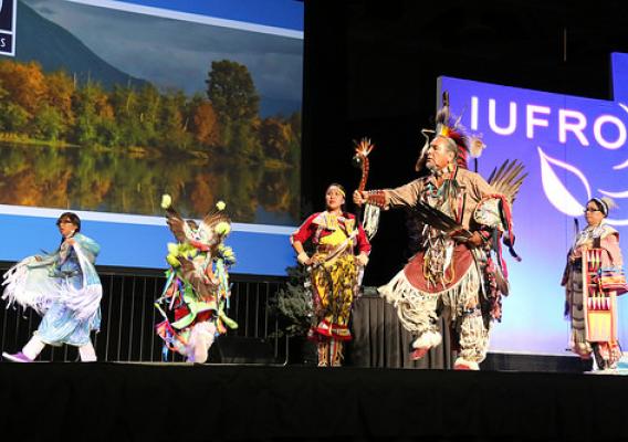 Nino Reyos and Twoshields Production Co. perform native dances for the opening ceremony at the International Union of Forest Research Organizations in Salt Lake City. (U.S. Forest Service)