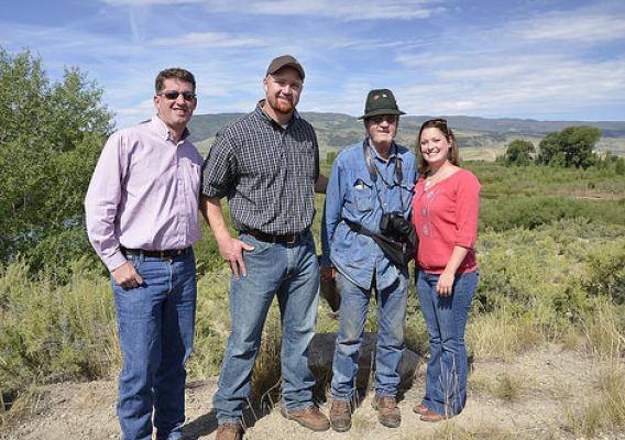 Chris West (who directed CCALT up until May 2015), left, celebrating conservation progress at the Yust ranch with Jay and Jim Yust, and CCALT's Carolyn Aspelin