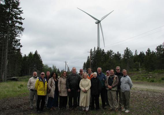 USDA Officials tour a new USDA-funded wind project that meets much of the power needs of a Maine island.