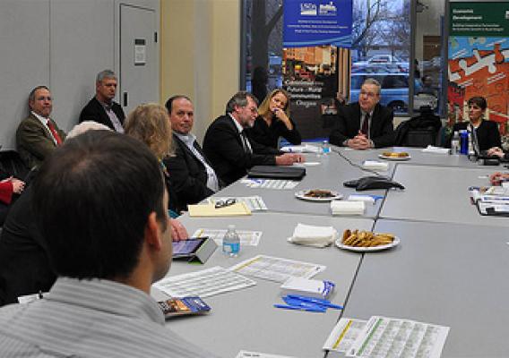 Under Secretary Dallas Tonsager, in Oregon, (center of table) meets with business, technology, education, agriculture, finance and state government representatives to discuss job creation.