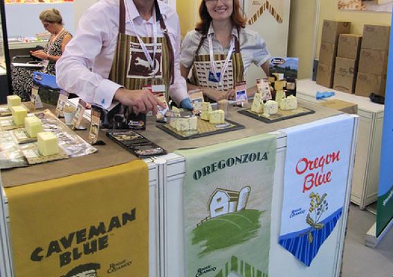 Rogue Creamery representatives display some of their popular cheeses during a 2011 international trade show in Hong Kong. The Oregon company credits the Foreign Agricultural Service’s (FAS) Market Access Program (MAP) and industry partners for helping the company expand international sales of its award-winning cheeses. (Courtesy Photo)