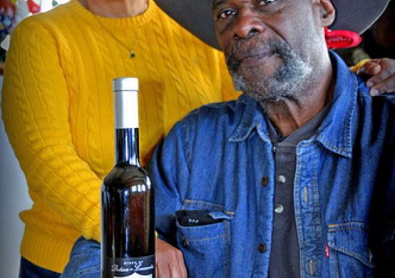 The husband and wife team of Alphonse and Martha Dotson have created a bottled masterpiece, Gotas de Oro, “drops of gold.” Photo by Jaime Tankersley, NRCS Texas. 