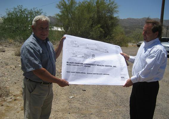 Architect Gary King and Dr. Randy Hancock look over the plans for the new Black Canyon Community Health Center.                                        