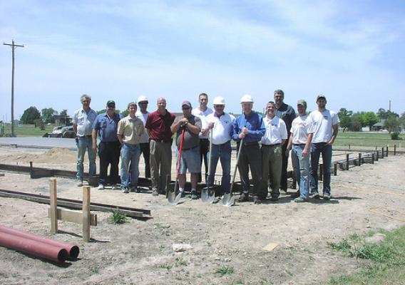 Earlier this month, the City of Quinter, Kansas, celebrated the groundbreaking of a new fire station with city employees, members of the volunteer fire department, USDA Rural Development staff, and representatives from Midwest Energy and Quinter Manufacturing & Construction (QMC). This photo was taken by a USDA employee.
