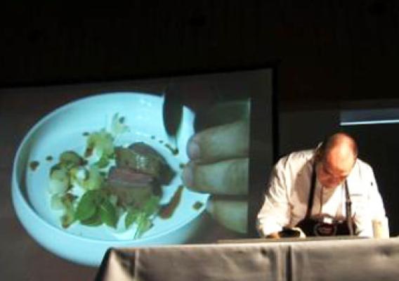 Dutch Chef Eric Troost prepares an upscale dish using U.S. beef during a cooking demonstration for about 130 Belgian chefs Sept. 24. The demo was part of the first U.S. beef tasting event held in Belgium, which was hosted by the Foreign Agricultural Service (FAS) office in The Hague, Netherlands, and the U.S. Meat Export Federation (USMEF). The tasting was part of ongoing efforts to help expand U.S. beef exports to the European Union (EU). (Photo courtesy FAS The Hague) 