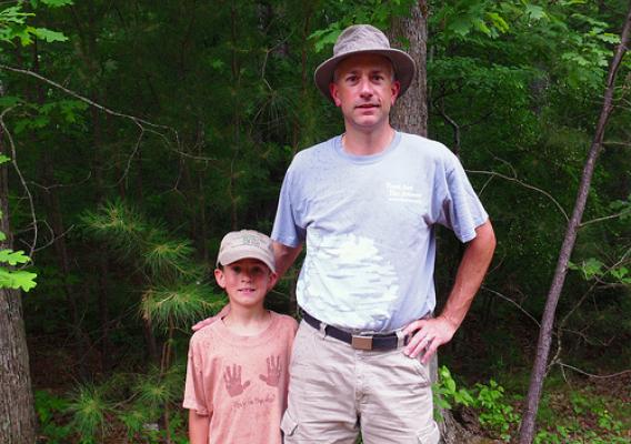 Noah Scott and his father Andy, a scientist with the U.S. Forest Service.