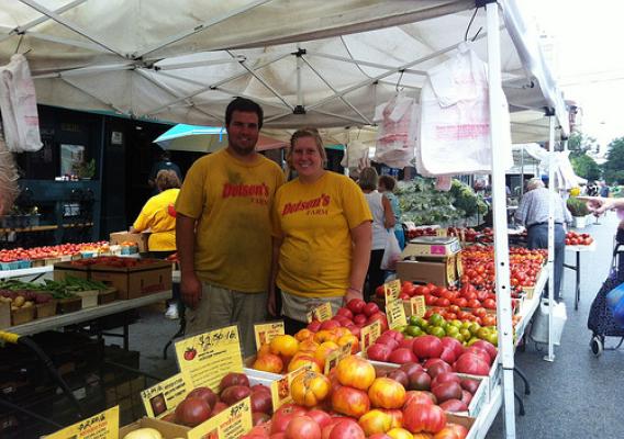Bonnie Dotson and her husband Josh sell fresh fruits and vegetables from their farm at Division Street Market in Chicago, IL. 