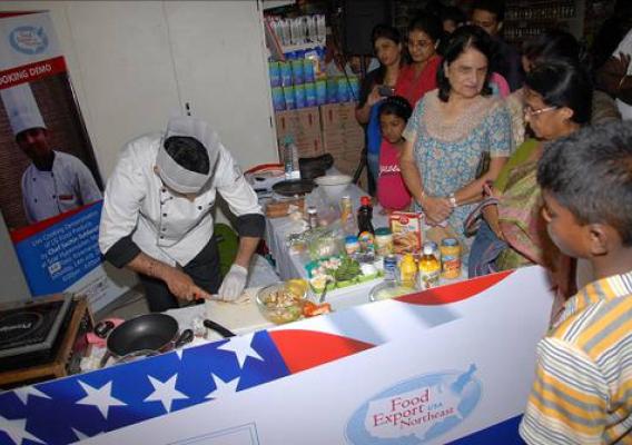 Chef Sachin Subbaiah of India prepares a grilled chicken salad during a live cooking demonstration  at SPAR Hypermarket in Bangalore, India, as part of the U.S. Food and Beverage Independence Festival. The festival was the first multi-retailer U.S. food and beverage promotional campaign held throughout cities in India from June 29 to July 22.