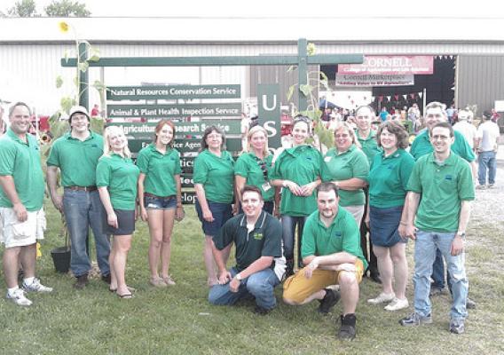 New York Rural Development, Farm Service Agency and National Resource Conservation Service staff members gather to celebrate USDA’s 150th anniversary at the Empire Farm Days