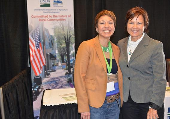 Tawney Brunsch, Executive Director of the Native CDFI, Lakota Fund with USDA Rural Development State Director Elsie Meeks at the StrikeForce conference. USDA photos