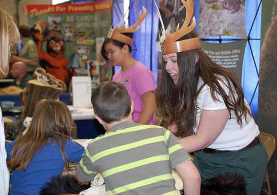 Youth learn about the characteristics of various wildlife species from acting Public Affairs Officer Jennifer Velez. (US Forest Service photo/Sam Cuenca)  