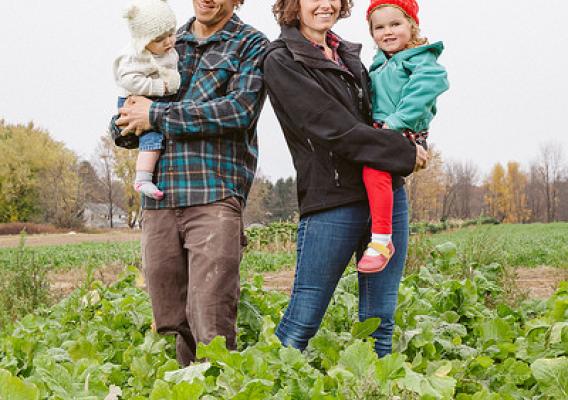 Lindsey and Ben Shute and their two daughters on the family’s 70 acre vegetable farm. Photo Credit: Joshua Simpson Photography.