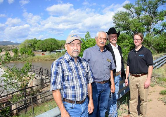 NRCS Chief Jason Weller (far right) touring acequias in New Mexico