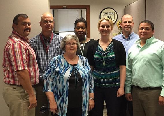 Associate Deputy Administrator Melissa Bailey (center) with staff from Fort Worth, Texas PACA division