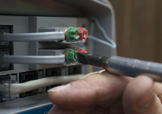 A man working on broadband systems