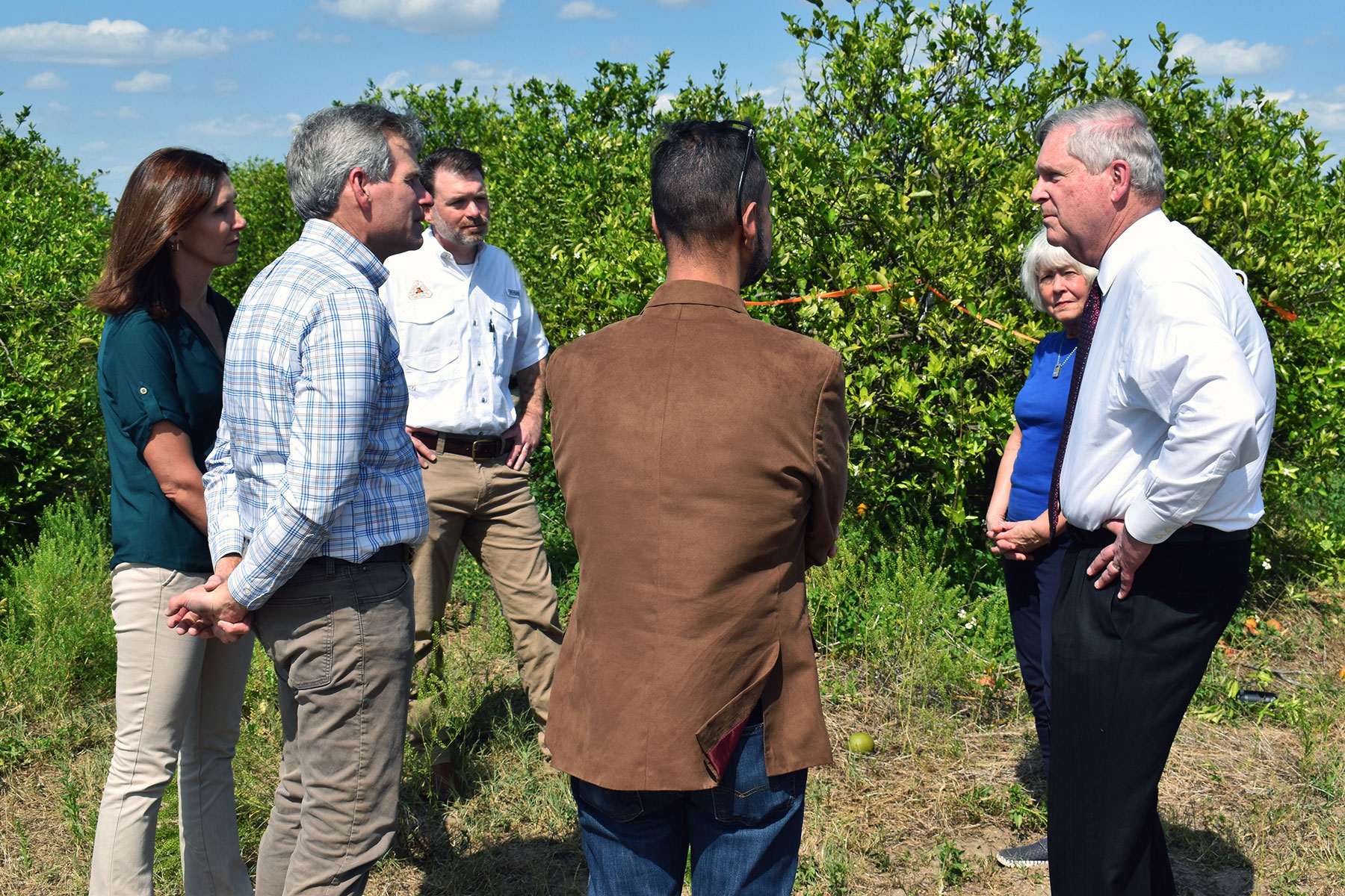 Agriculture Secretary Tom Vilsack with producers in Florida